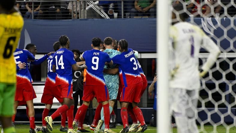 Mar 21, 2024; Arlington, Texas, USA; The United States team celebrates scoring the game tying goal against Jamaica goalkeeper Andre Blake (1) during the second half at AT&T Stadium. Mandatory Credit: Jerome Miron-USA TODAY Sports
