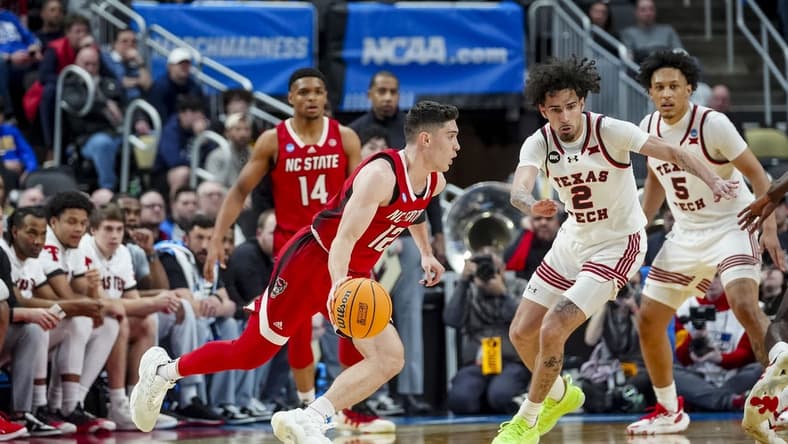 Mar 21, 2024; Pittsburgh, PA, USA; North Carolina State Wolfpack guard Michael O'Connell handles the ball during the first half in the first round of the 2024 NCAA Tournament at PPG Paints Arena. Mandatory Credit: Gregory Fisher-USA TODAY Sports