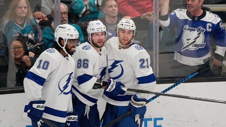 Mar 21, 2024; San Jose, California, USA; Tampa Bay Lightning center Brayden Point (21) celebrates with right wing Nikita Kucherov (86) and left wing Anthony Duclair (10) after scoring his second goal of the game against the San Jose Sharks during the third period at SAP Center at San Jose. Mandatory Credit: Robert Edwards-USA TODAY Sports