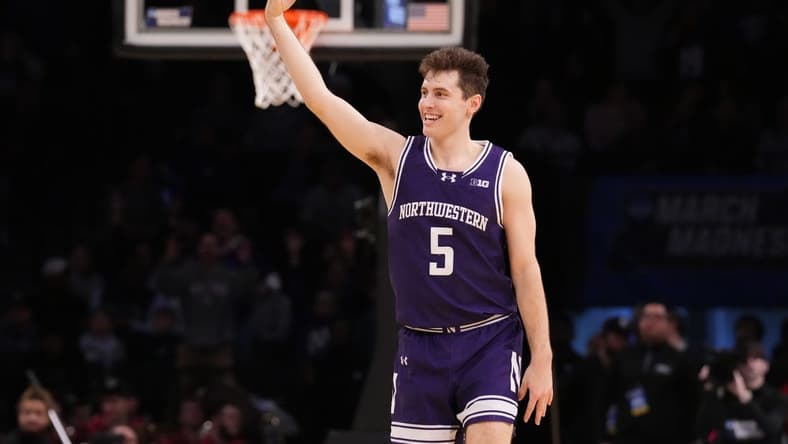 March 22, 2024, Brooklyn, NY, USA; Northwestern Wildcats guard Ryan Langborg (5) reacts after a three pointer in overtime against the Florida Atlantic Owls in the first round of the 2024 NCAA Tournament at the Barclays Center. Mandatory Credit: Robert Deutsch-USA TODAY Sports