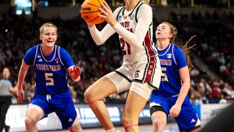 Mar 22, 2024; Columbia, SC, USA; South Carolina Gamecocks forward Chloe Kitts (21) drives against the Presbyterian Blue Hose in the first half at Colonial Life Arena. Mandatory Credit: Jeff Blake-USA TODAY Sports