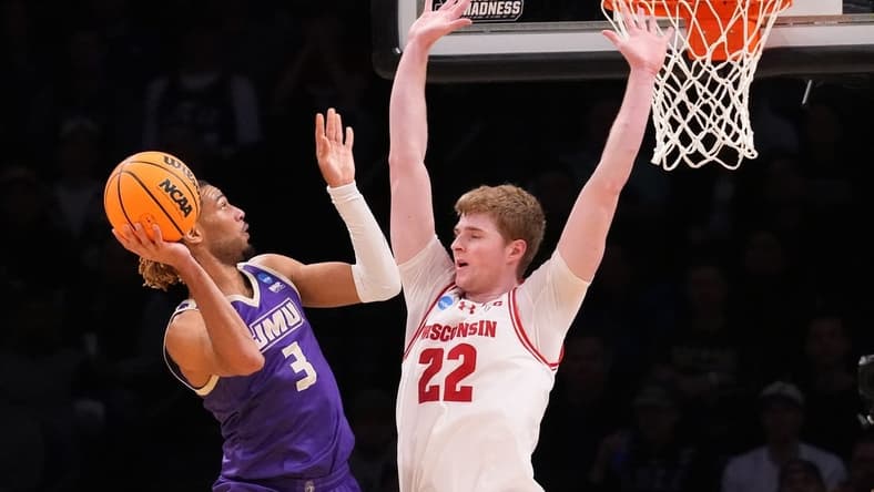 Mar 22, 2024; Brooklyn, NY, USA; James Madison Dukes forward T.J. Bickerstaff (3) shoots the ball over Wisconsin Badgers forward Steven Crowl (22) in the first round of the 2024 NCAA Tournament at the Barclays Center. Mandatory Credit: Robert Deutsch-USA TODAY Sports