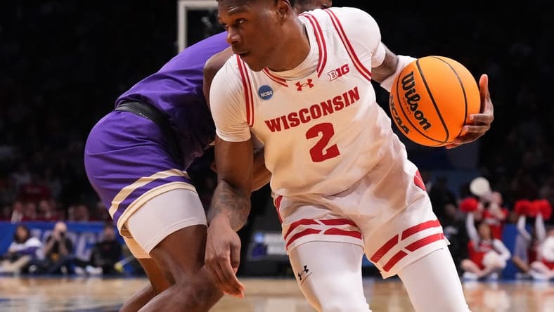 Mar 22, 2024; Brooklyn, NY, USA; Wisconsin Badgers guard AJ Storr (2) dribbles the ball against the James Madison Dukes in the first round of the 2024 NCAA Tournament at the Barclays Center.  Mandatory Credit: Robert Deutsch-USA TODAY Sports