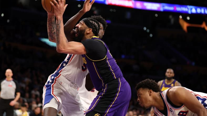Mar 22, 2024; Los Angeles, California, USA;  Los Angeles Lakers forward Anthony Davis (3) goes to the basket against Philadelphia 76ers center Mo Bamba (5) during the fourth quarter at Crypto.com Arena. Mandatory Credit: Kiyoshi Mio-USA TODAY Sports
