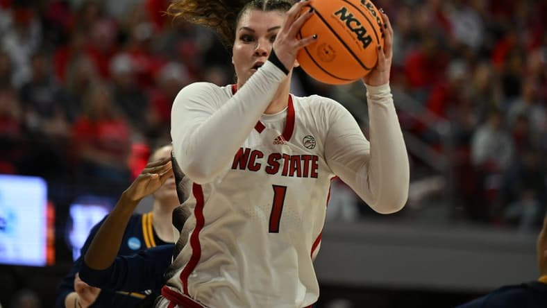 Mar 23, 2024; Raleigh, North Carolina, USA; NC State Wolfpack center River Baldwin (1) grabs a rebound in the first round of the 2024 NCAA Women's Tournament at James T. Valvano Arena at William Neal Reynolds. Mandatory Credit: William Howard-USA TODAY Sports