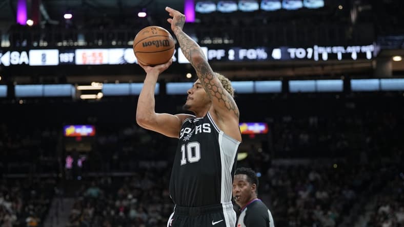 Mar 23, 2024; San Antonio, Texas, USA;  San Antonio Spurs forward Jeremy Sochan (10) shoots in the first half against the Phoenix Suns at Frost Bank Center. Mandatory Credit: Daniel Dunn-USA TODAY Sports
