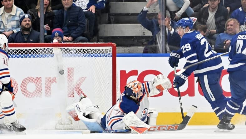 Mar 23, 2024; Toronto, Ontario, CAN; Toronto Maple Leafs forward Pontus Holmberg (29) scores a goal past Edmonton Oilers goalie Stuart Skinner (74) in the second period at Scotiabank Arena. Mandatory Credit: Dan Hamilton-USA TODAY Sports