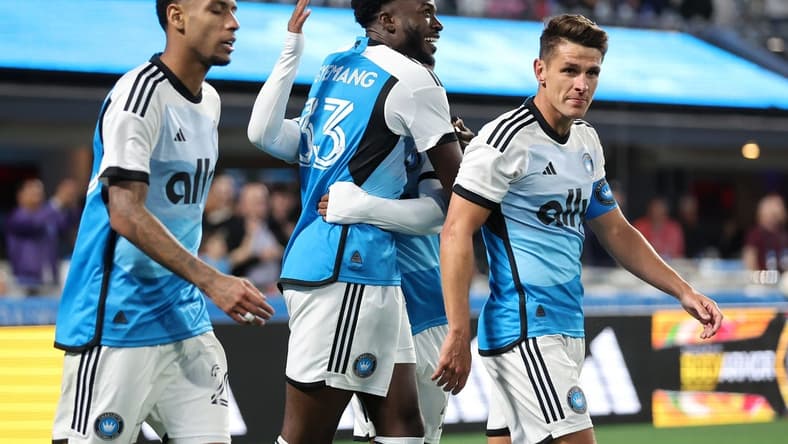 Mar 23, 2024; Charlotte, North Carolina, USA; Charlotte FC forward Patrick Agyemang (33) reacts after scoring a goal against the Columbus Crew in the second half at Bank of America Stadium. Mandatory Credit: Cory Knowlton-USA TODAY Sports