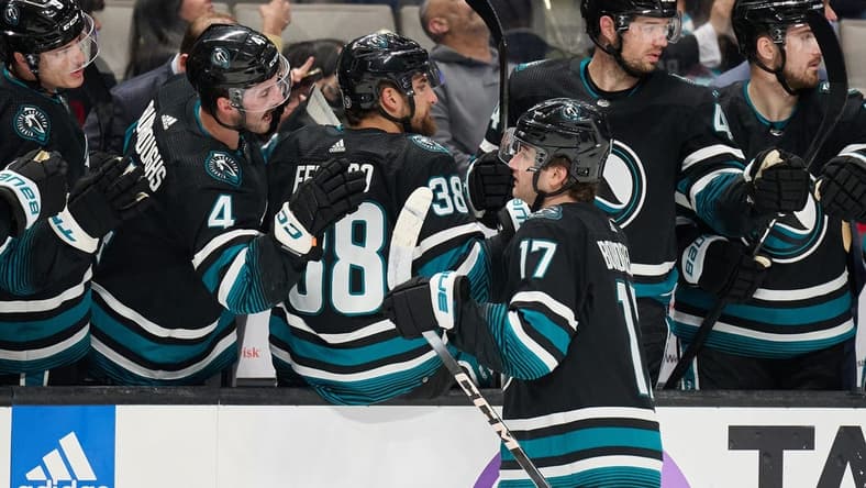 Mar 23, 2024; San Jose, California, USA; San Jose Sharks center Thomas Bordeleau (17) shakes hands with his teammates on the bench after scoring a goal against the Chicago Blackhawks during the first period at SAP Center at San Jose. Mandatory Credit: Robert Edwards-USA TODAY Sports