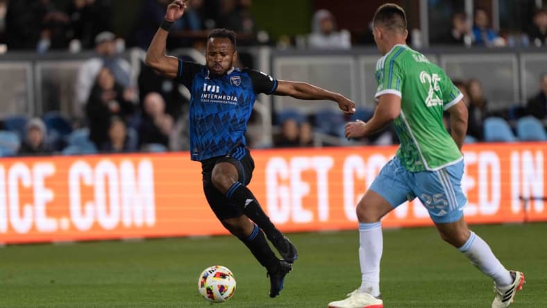Mar 24, 2024; San Jose, California, USA; San Jose Earthquakes forward Jeremy Ebobisse (11) dribbles against Seattle Sounders FC defender Jackson Ragen (25) during the second half at PayPal Park. Mandatory Credit: Stan Szeto-USA TODAY Sports