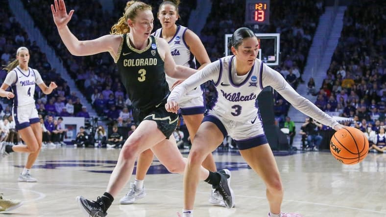 Mar 24, 2024; Manhattan, Kansas, USA; Kansas State Wildcats guard Jaelyn Glenn (3) dribbles against Colorado Buffaloes guard Frida Formann (3) during the first quarter at Bramlage Coliseum. Mandatory Credit: Scott Sewell-USA TODAY Sports