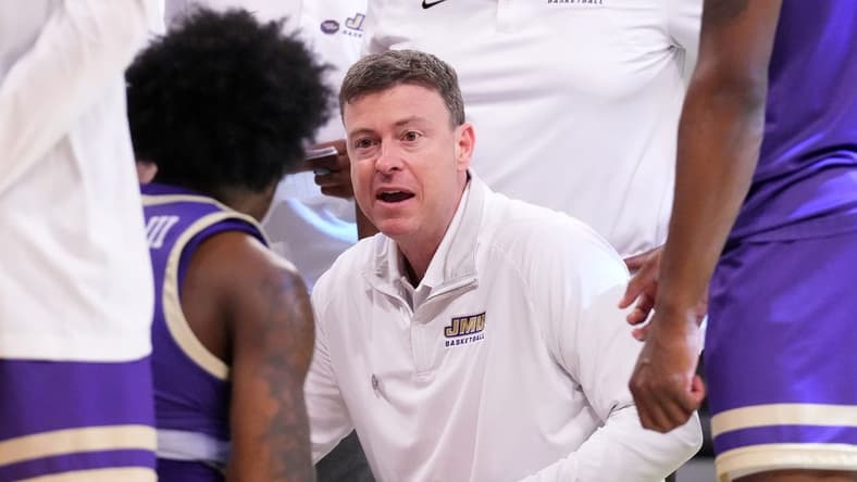Mar 24, 2024; Brooklyn, NY, USA; James Madison Dukes head coach Mark Byington talks to the team during a time out against the Duke Blue Devils in the second round of the 2024 NCAA Tournament at Barclays Center. Mandatory Credit: Robert Deutsch-USA TODAY Sports