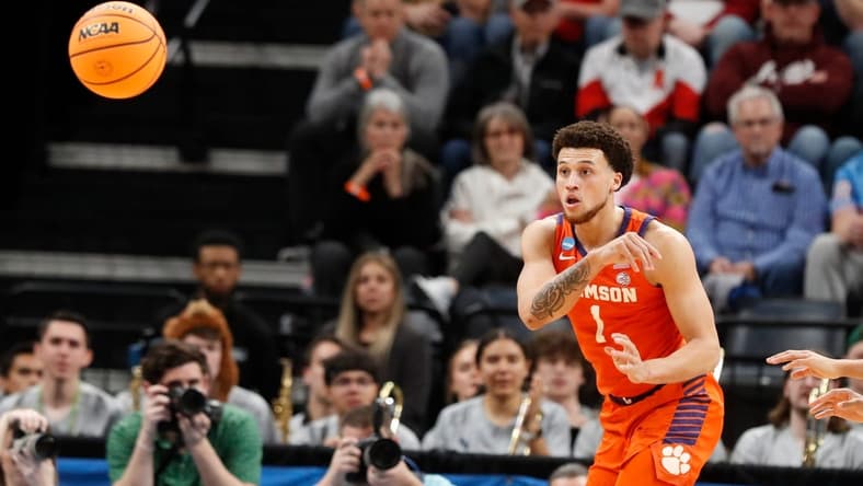 Clemson's Chase Hunter (1) passes the ball during the second round game between Clemson University and Baylor University in the 2024 NCAA Tournament at FedExForum in Memphis, Tenn., on Sunday, March 24, 2024.