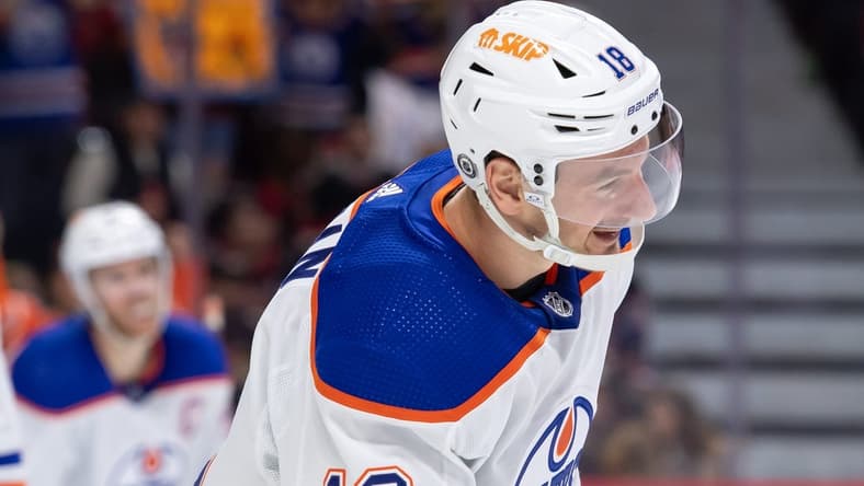 Mar 24, 2024; Ottawa, Ontario, CAN; Edmonton Oilers left wing Zach Hyman (18) skates to the bench after scoring in the second period against the Ottawa Senators at the Canadian Tire Centre. Mandatory Credit: Marc DesRosiers-USA TODAY Sports
