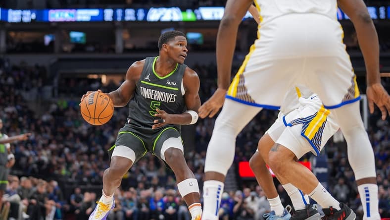 Mar 24, 2024; Minneapolis, Minnesota, USA; Minnesota Timberwolves guard Anthony Edwards (5) dribbles against the Golden State Warriors in the second quarter at Target Center. Mandatory Credit: Brad Rempel-USA TODAY Sports