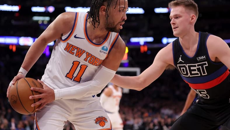 Mar 25, 2024; New York, New York, USA; New York Knicks guard Jalen Brunson (11) controls the ball against Detroit Pistons forward Buddy Boeheim (35) during the second quarter at Madison Square Garden. Mandatory Credit: Brad Penner-USA TODAY Sports