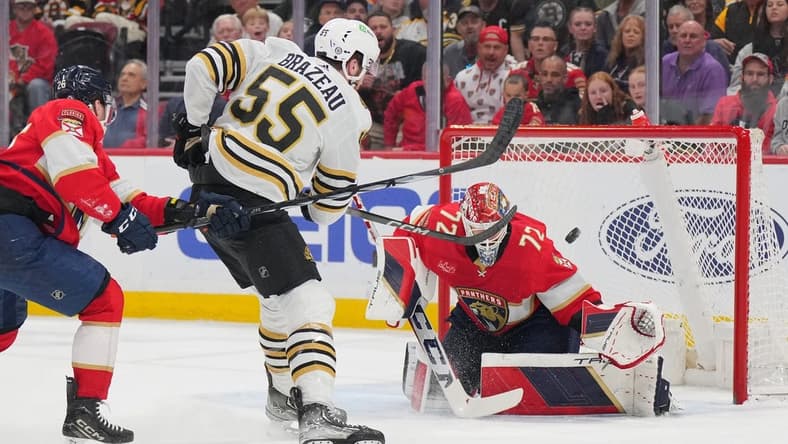 Mar 26, 2024; Sunrise, Florida, USA; Boston Bruins right wing Justin Brazeau (55) takes a shot on goal as Florida Panthers goaltender Sergei Bobrovsky (72) makes a save in the first period at Amerant Bank Arena. Mandatory Credit: Jim Rassol-USA TODAY Sports