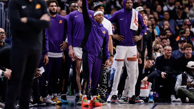 Mar 27, 2024; Denver, Colorado, USA; Phoenix Suns guard Isaiah Thomas (4) gestures from the bench in the fourth quarter against the Denver Nuggets at Ball Arena. Mandatory Credit: Isaiah J. Downing-USA TODAY Sports