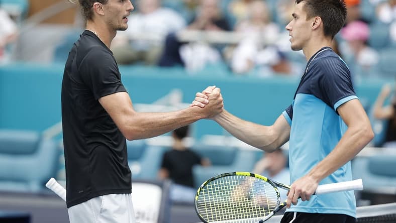 Mar 28, 2024; Miami Gardens, FL, USA; Alexander Zverev (GER) (L) shakes hands with Fabian Marozsan (HUN) (R) after their match on day eleven of the Miami Open at Hard Rock Stadium. Mandatory Credit: Geoff Burke-USA TODAY Sports