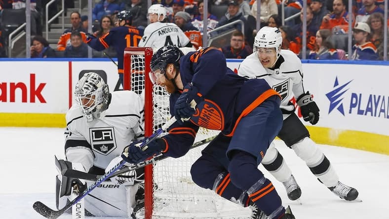 Mar 28, 2024; Edmonton, Alberta, CAN; Edmonton Oilers forward Connor Brown (28) tries to jam a puck past Los Angeles Kings goaltender Cam Talbot (39) during the first period at Rogers Place. Mandatory Credit: Perry Nelson-USA TODAY Sports
