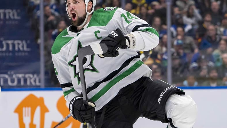 Mar 28, 2024; Vancouver, British Columbia, CAN; Dallas Stars forward Jamie Benn (14) celebrates his goal against the Vancouver Canucks in the third period at Rogers Arena. Dallas won 3 - 1. Mandatory Credit: Bob Frid-USA TODAY Sports