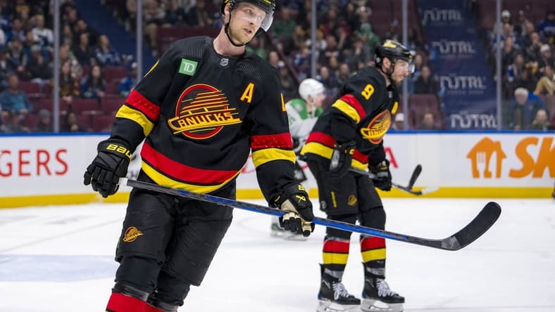 Mar 28, 2024; Vancouver, British Columbia, CAN; Vancouver Canucks forward Elias Pettersson (40) reacts after losing to the Dallas Stars at Rogers Arena. Dallas won 3 - 1. Mandatory Credit: Bob Frid-USA TODAY Sports