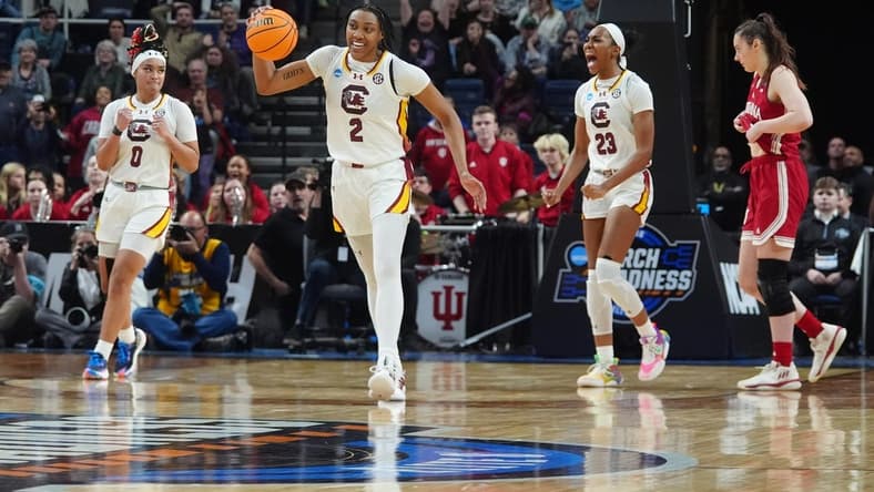Mar 29, 2024; Albany, NY, USA; South Carolina Gamecocks forward Ashlyn Watkins (2) celebrates the victory over the Indiana Hoosiers in the semifinals of the Albany Regional of the 2024 NCAA Tournament at the MVP Arena. Mandatory Credit: Gregory Fisher-USA TODAY Sports