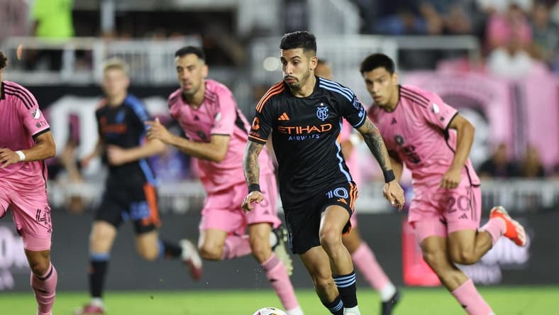 Mar 30, 2024; Fort Lauderdale, Florida, USA; New York City FC forward Santiago Rodriguez (10) dribbles against Inter Miami CF during the first half at Chase Stadium. Mandatory Credit: Nathan Ray Seebeck-USA TODAY Sports
