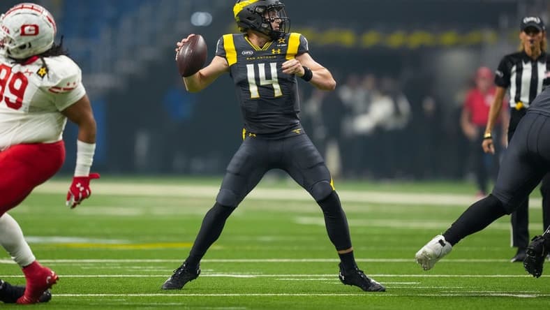 Mar 31, 2024; San Antonio, TX, USA; San Antonio Brahmas quarterback Chase Garbers (14) throws a pass in the first half against the DC Defenders at The Alamodome. Mandatory Credit: Daniel Dunn-USA TODAY Sports