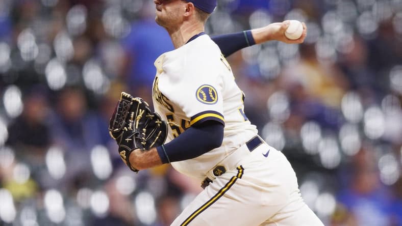 Oct 4, 2022; Milwaukee, Wisconsin, USA; Milwaukee Brewers pitcher Jake Cousins (54) throws a pitch during the seventh inning against the Arizona Diamondbacks at American Family Field. Mandatory Credit: Jeff Hanisch-USA TODAY Sports