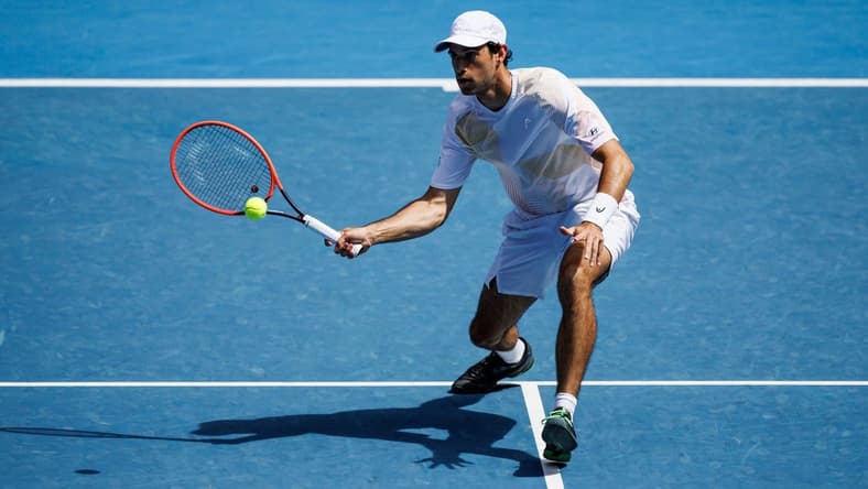 Jan 22, 2024; Melbourne, Victoria, Australia; Nuno Borges of Portugal hits a shot against Daniil Medvedev of Russia in the fourth round of the men   s singles at the Australian Open in MelbourneMandatory Credit: Mike Frey-USA TODAY Sports