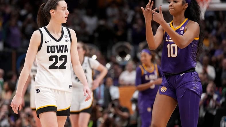 Angel Reese (10) shows Iowa Caitlin Clark her ring finger during the final seconds of the women's NCAA Tournament national championship game.
Syndication Hawkcentral
