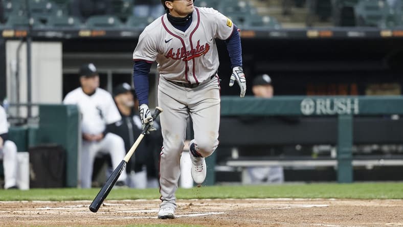 Apr 1, 2024; Chicago, Illinois, USA; Atlanta Braves third baseman Austin Riley (27) watches his three-run home run against the Chicago White Sox during the eight inning at Guaranteed Rate Field. Mandatory Credit: Kamil Krzaczynski-USA TODAY Sports