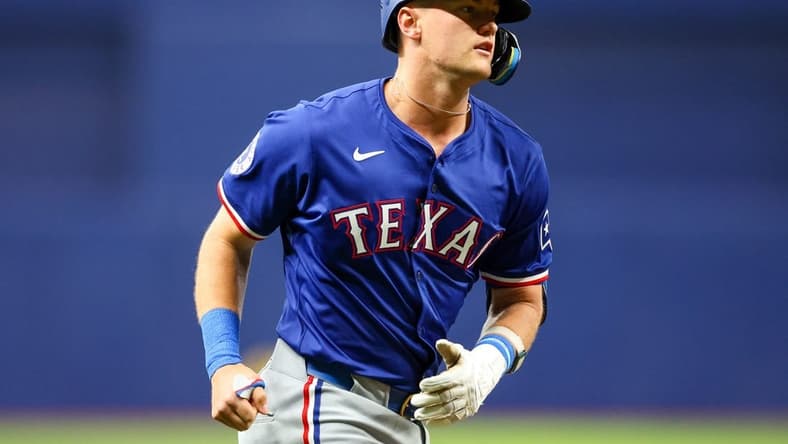 Apr 1, 2024; St. Petersburg, Florida, USA; Texas Rangers third baseman Josh Jung (6) runs the bases after hitting a three run home run against the Tampa Bay Rays in the first inning at Tropicana Field. Mandatory Credit: Nathan Ray Seebeck-USA TODAY Sports