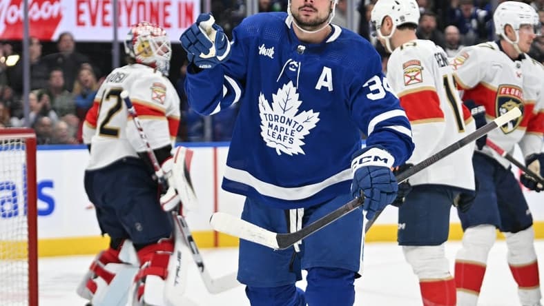 Apr 1, 2024; Toronto, Ontario, CAN; Toronto Maple Leafs forward Auston Matthews (34) celebrates after scoring a goal against the Florida Panthers in the first period at Scotiabank Arena. Mandatory Credit: Dan Hamilton-USA TODAY Sports