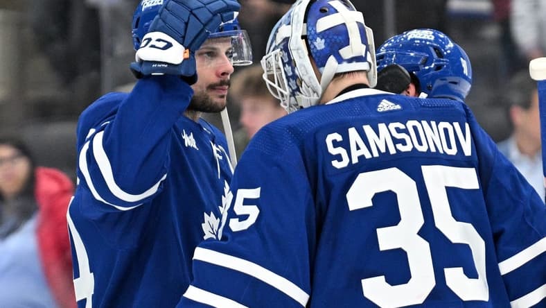 Apr 1, 2024; Toronto, Ontario, CAN; Toronto Maple Leafs forward Auston Matthews (34) greets goalie Ilya Samsonov (35) after a win over the Florida Panthers at Scotiabank Arena. Mandatory Credit: Dan Hamilton-USA TODAY Sports