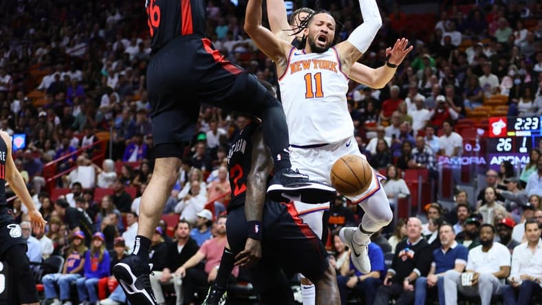 Apr 2, 2024; Miami, Florida, USA; New York Knicks guard Jalen Brunson (11) reacts after driving to the basket against Miami Heat forward Caleb Martin (16) during the first quarter at Kaseya Center. Mandatory Credit: Sam Navarro-USA TODAY Sports