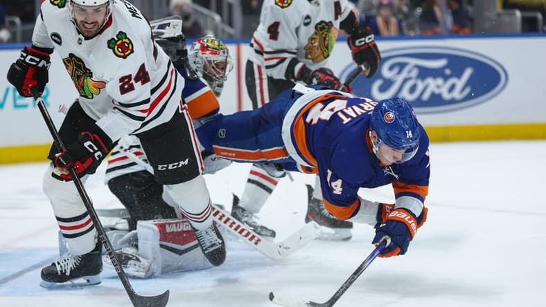 Apr 2, 2024; Elmont, New York, USA; New York Islanders center Bo Horvat (14) after shot in front of the goal against the Chicago Blackhawks during the second period at UBS Arena. Mandatory Credit: Thomas Salus-USA TODAY Sports