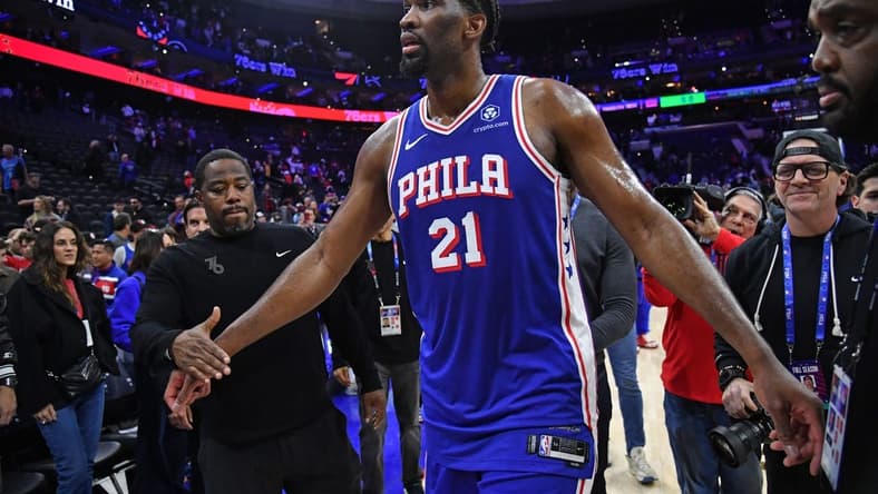 Apr 2, 2024; Philadelphia, Pennsylvania, USA; Philadelphia 76ers center Joel Embiid (21) walks off the court after win against the Oklahoma City Thunder at Wells Fargo Center. Mandatory Credit: Eric Hartline-USA TODAY Sports
