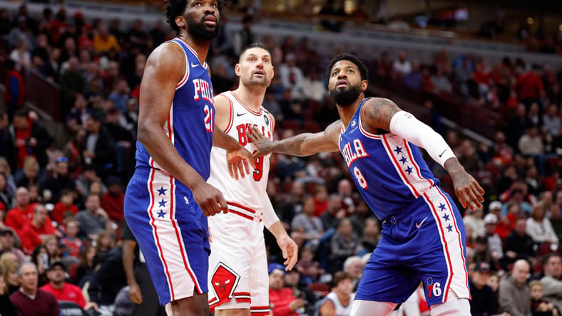 Philadelphia 76ers players Joel Embiid and Paul George