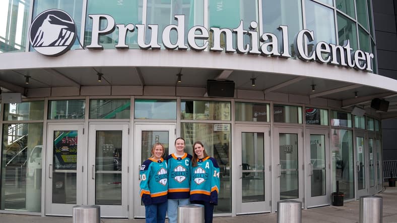 New York Sirens alternate captains Sarah Fillier and Jaime Bourbonnais with captain Micah Zandee-Hart.