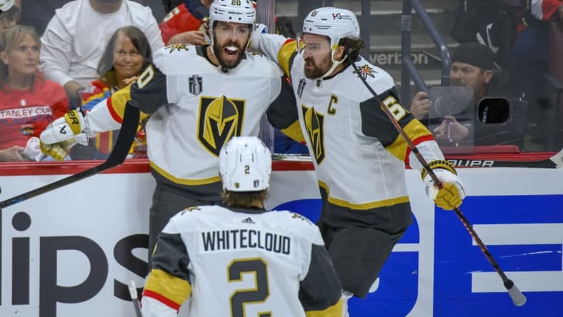 SUNRISE, FL - JUNE 10: Vegas Golden Knights center Chandler Stephenson (20) celebrates scoring a goal with Vegas Golden Knights right wing Mark Stone (61) and Vegas Golden Knights defenseman Zach Whitecloud (2)during Game Four of the NHL Stanley Cup Final between the Vegas Golden Knights and the Florida Panthers on June 10, 2023 at the FLA Live Arena in Sunrise, Florida. (Photo by Doug Murray/Icon Sportswire)