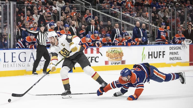 Vegas Golden Knights' Mark Stone (61) get the open net goal as Edmonton Oilers' Connor McDavid (97) tries to stop him during the third period of an NHL hockey game Wednesday, Nov. 6, 2024 in Edmonton, Alberta. (Jason Franson/The Canadian Press via AP)