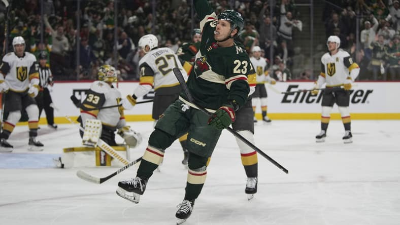 Minnesota Wild center Marco Rossi (23) celebrates after scoring during the first period of Game 3 of a first-round NHL hockey playoff series against the Vegas Golden Knights, Thursday, April 24, 2025, in St. Paul, Minn. (AP Photo/Abbie Parr)