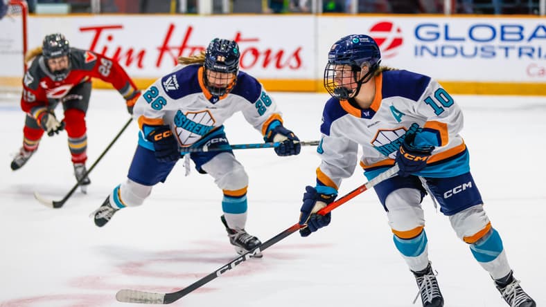 Sarah Fillier carries the puck for the New York Sirens, with rookie forward Casey O'Brien trailing.