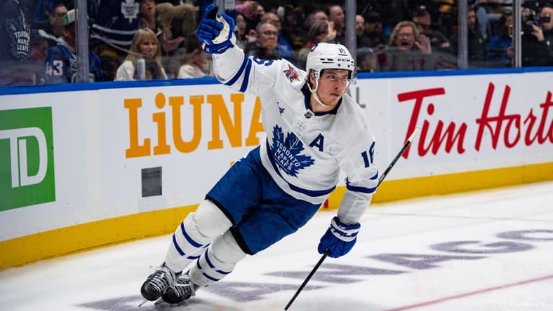 VANCOUVER, BC - JANUARY 20: Toronto Maple Leafs right wing Mitchell Marner (16) celebrates after his goal during an NHL game between the Toronto Maple Leafs and the Vancouver Canucks on January 20, 2024 at Rogers Arena in Vancouver, BC. (Photo by Ethan Cairns/Icon Sportswire)
