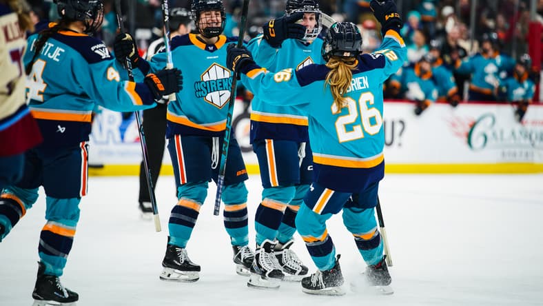 The New York Sirens celebrate a goal against the Montreal Victoire.