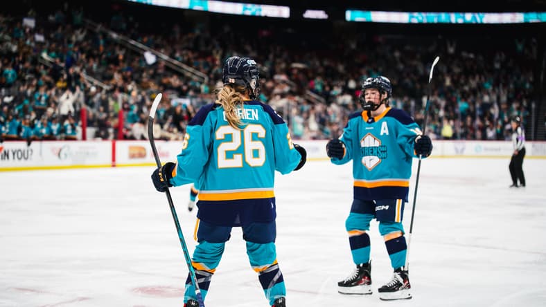 New York Sirens rookie Casey O'Brien celebrates with Sarah Fillier after a power-play goal.