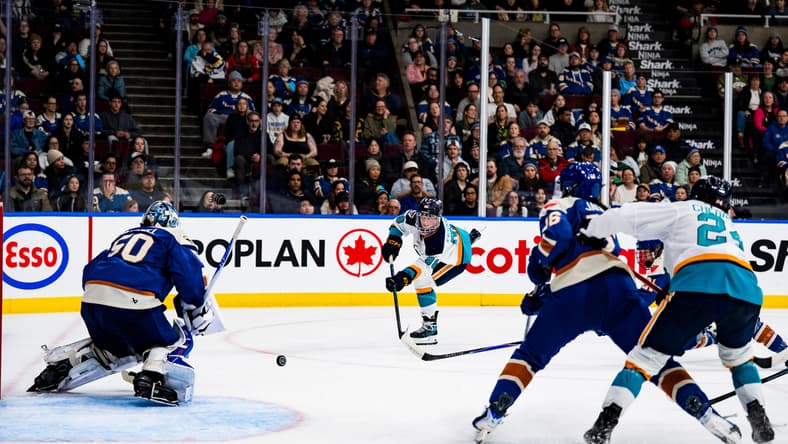 New York Sirens rookie Kristyna Kaltounkova fires a shot against Vancouver Goldeneyes goalie Kristen Campbell.
