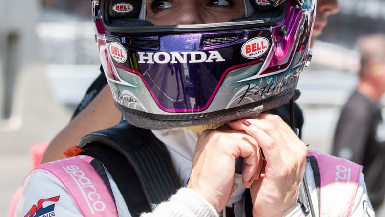 Dale Coyne Racing with RWR driver Katherine Legge (51) takes off her helmet Sunday, May 19, 2024, during practice ahead of